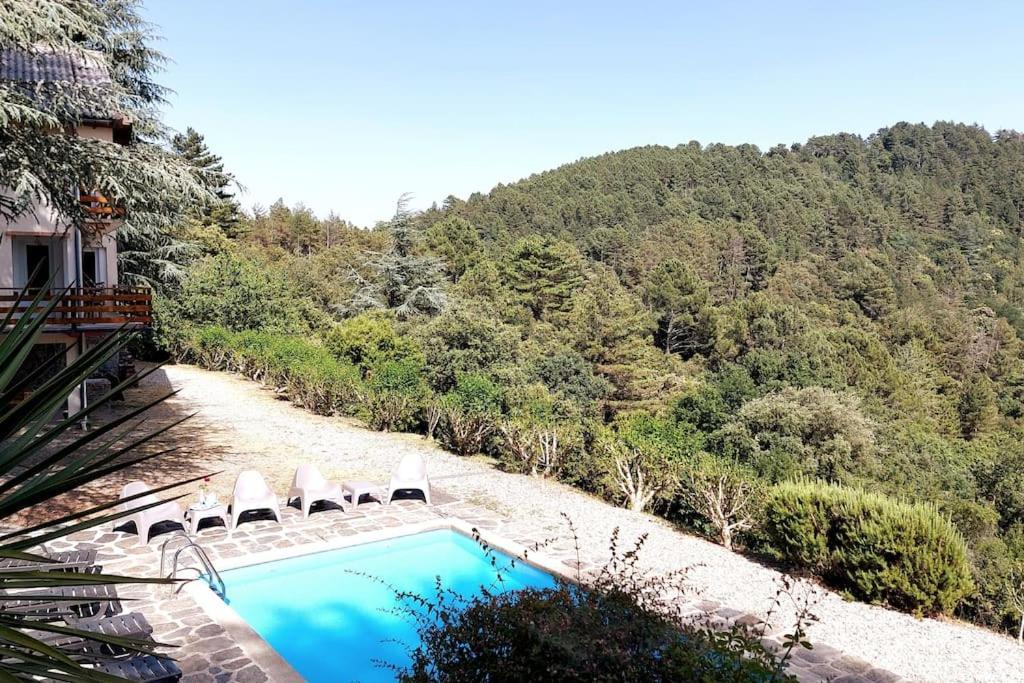 Chalet 14 pers avec vue panoramique et piscine chauffée Genolhac Exterior foto